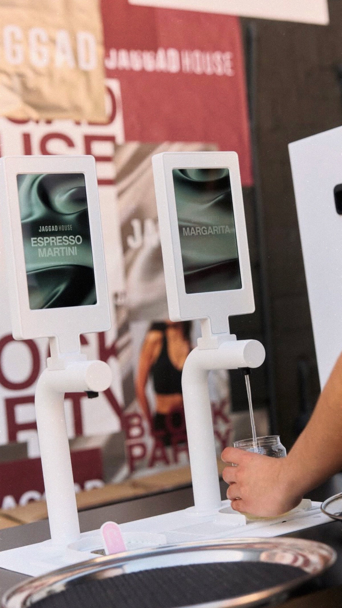Creative Tap, Beverage dispensing system with hand underneath